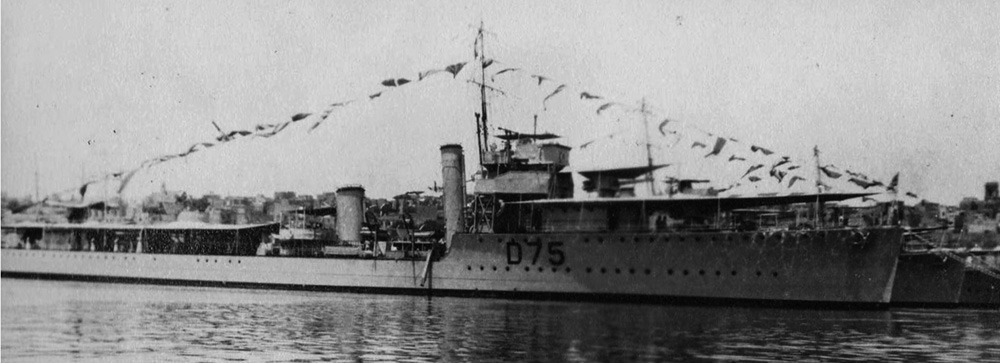 HMS Venous with awnings and flags in the Med, 1920s