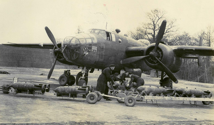 Ground crew load bombs into Michell