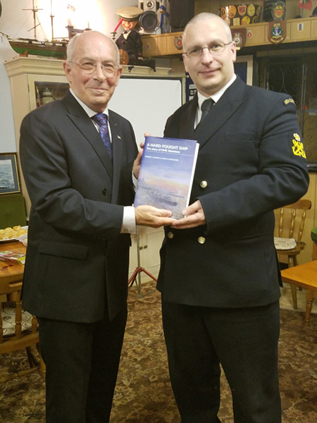 Rodgaard Presents Book to Sea Cadet atv Kings Lynne