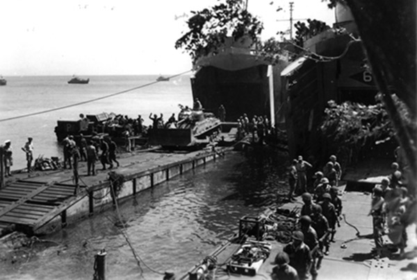 LST landing the Marine Brigade at Pasir Putih, East Java, 1947