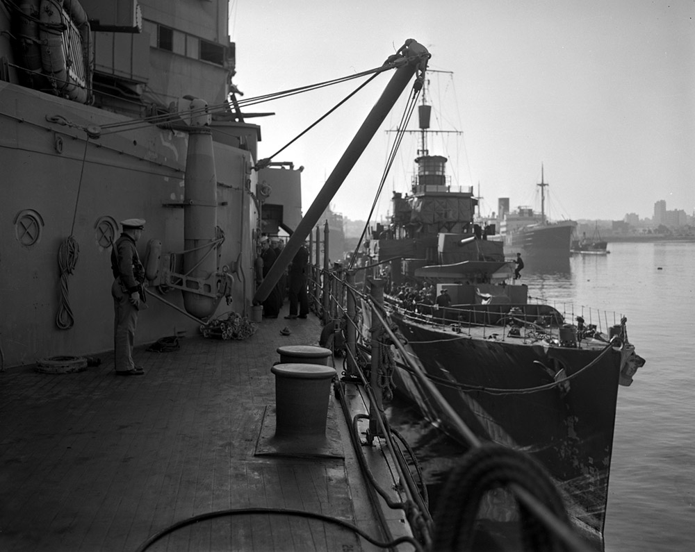 HMS Venomous berthed alongside USS Augusta