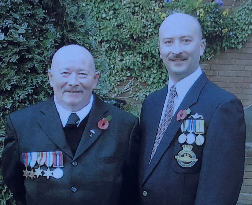 Dave Badman and his eldest son, Antony Jan Badman at the Hecla reuinion at Solihill in 2002 wearing their medals